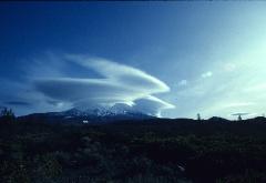 photograph of Mt. Shasta volcano in northern California, USA with lenticular clouds