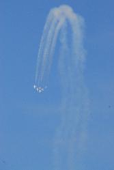 Thunderbirds in a dive with smoke trailing